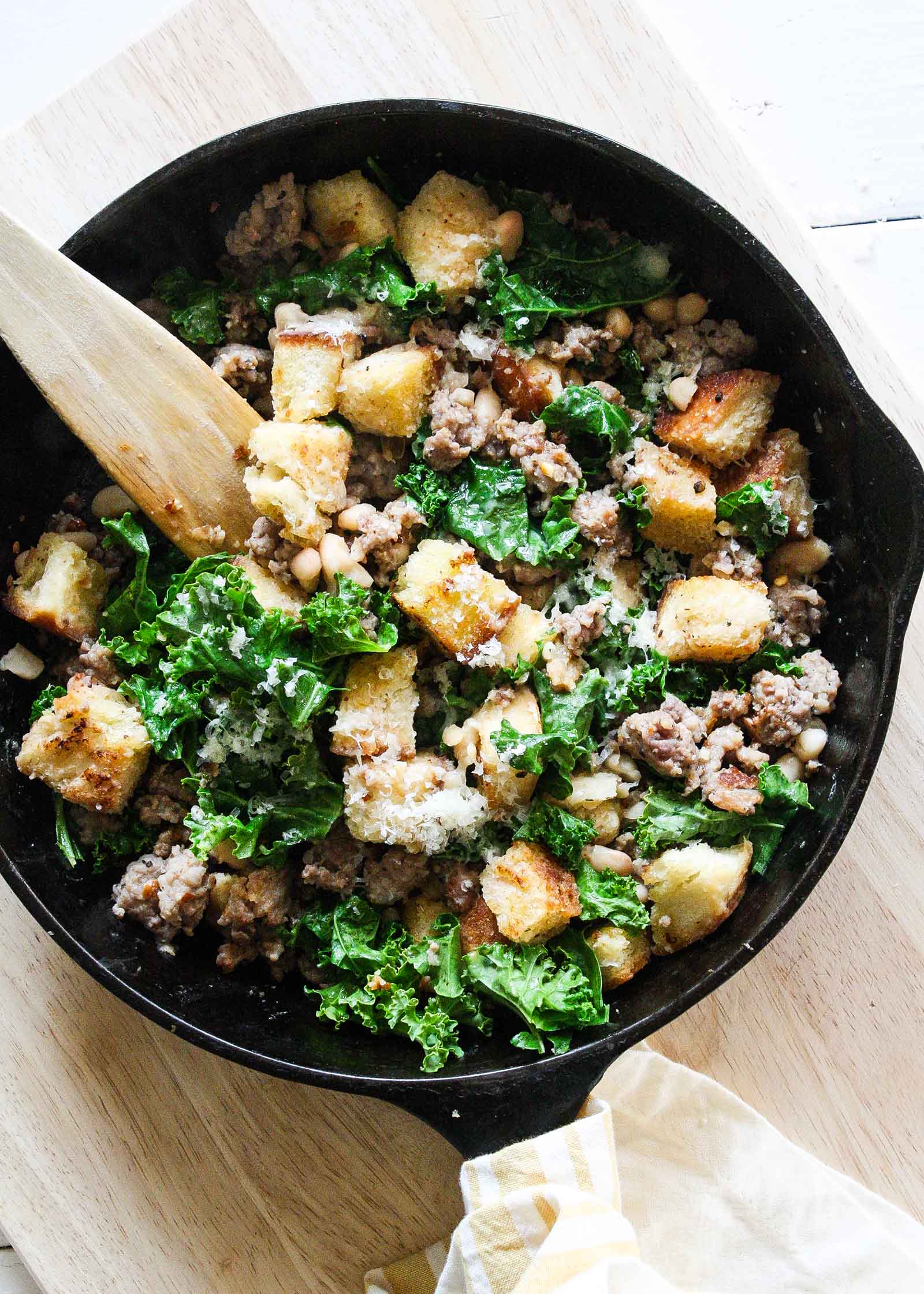 Budget-friendly dinners: Quick Sausage, Kale, and White Bean Skillet | Smitten Kitchen Everyday via Simply Recipes