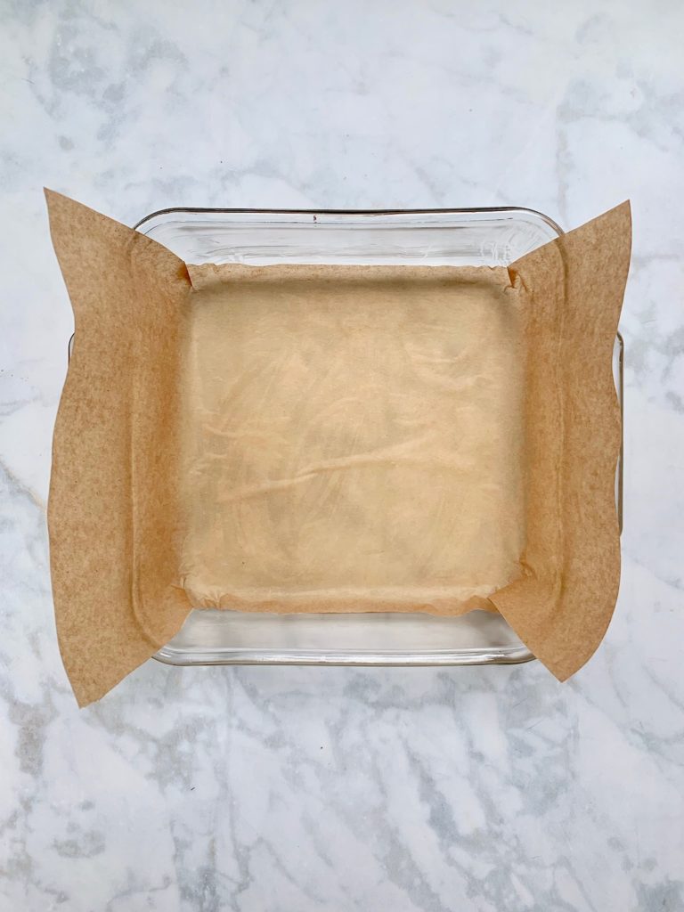How to remove brownies from the pan: parchment overhang | © Jane Sweeney Cool Mom Eats