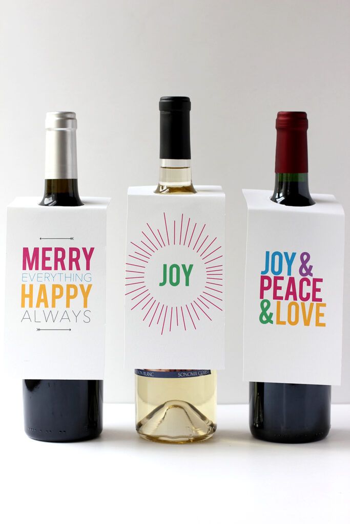 8 creative ways to gift wrap a bottle of wine: Try the free, printable wine gift tags from Alice & Lois. So festive!