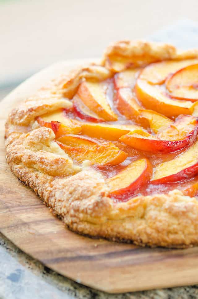 Add a little spiced rum to sweet peaches for a delicious Father's Day dessert from Fifteen Spatulas