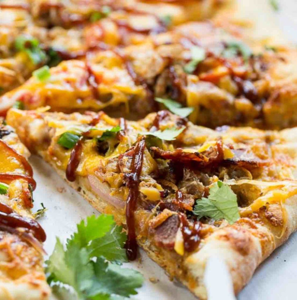 Southern BBQ Pizza with Pulled Pork froom Spicy Southern Kitchen : a fun twist on pizza night and great way to use up leftovers