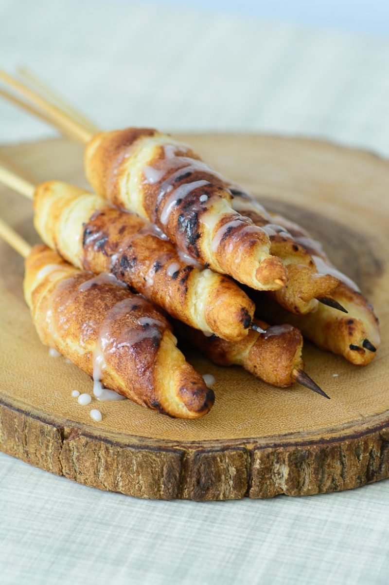 Easy backyard camping recipes: Cinnamon rolls on a stick at Almost Supermom