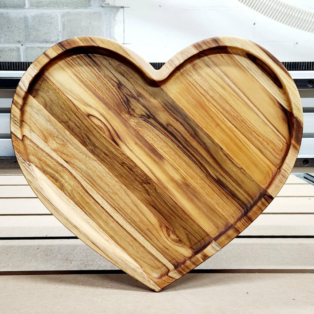 Wooden heart cheese board, handmade by Ang in Buffalo on Etsy -- perfect for a sexy Valentine's cheese plate at home