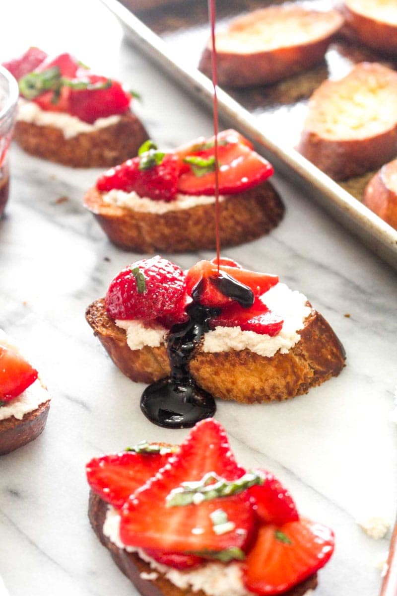 Easy spring appetizers for dinner at home: Strawberry bruschetta at Darn Good Veggies give you a little sweetness. These are vegan, but you can adapt the recipe