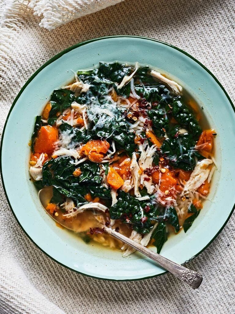 Weekly Meal Plan Ideas: Best Chicken Soup with Rice, Carrots, and Kale Recipe from former SAVEUR editor-in-chief Stacy Adimando