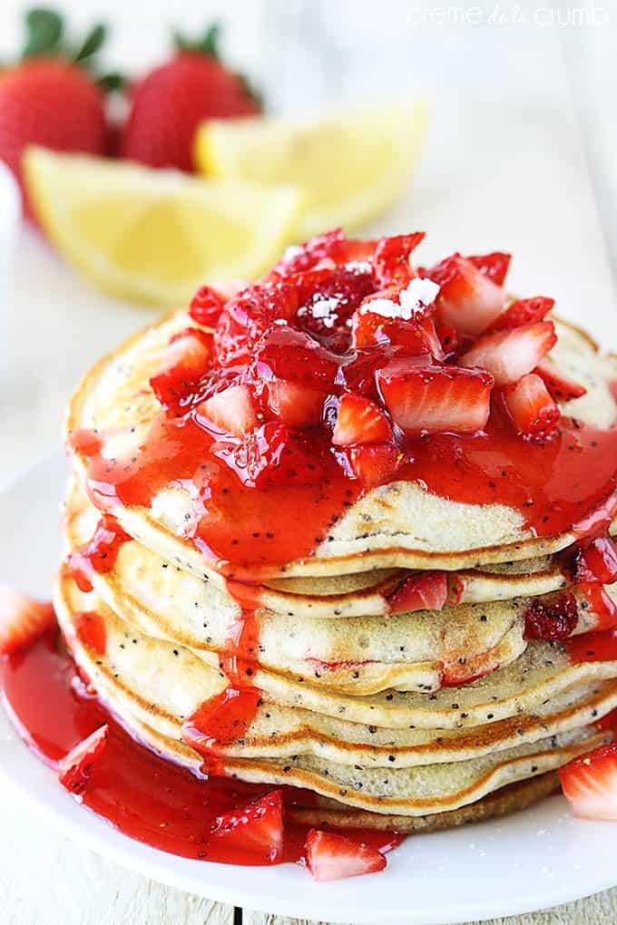 Perfect for Valentine's Day, these lemon poppyseed pancakes from Creme de la Crumb look delicious smothered in strawberries