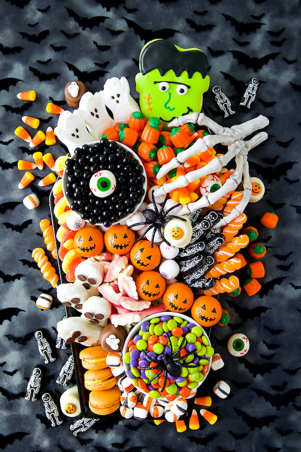 A candy-filled Halloween snack board from A Pumpkin and a Princess