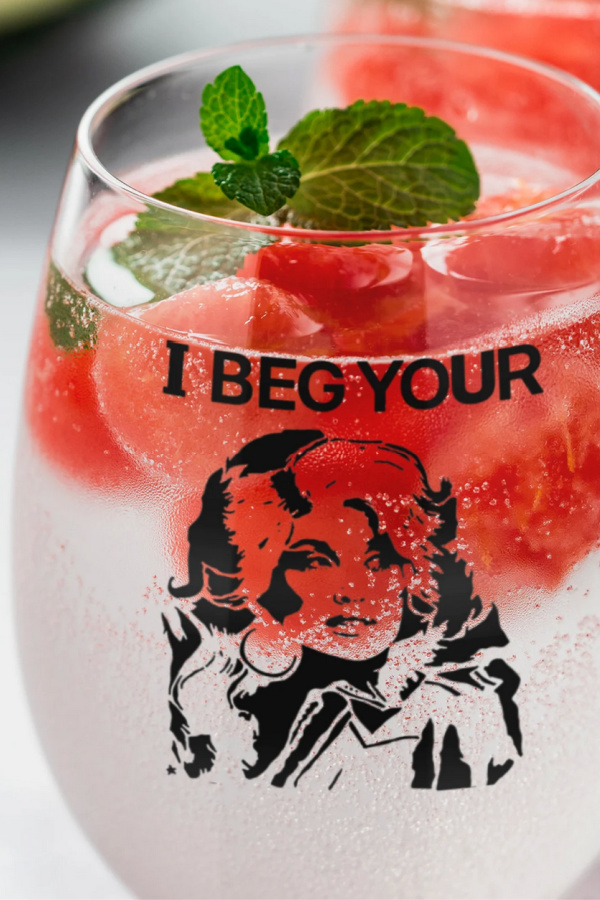 Dolly Parton gifts: I Beg Your Parton Wine Glass from MandMDesignsby Julio on Etsy 