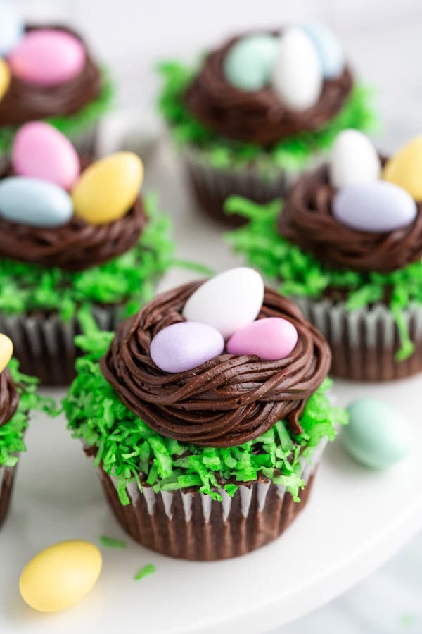 Cute Easter nest cupcake recipe from Amanda's Cookin' makes a nice addition to your dessert table.