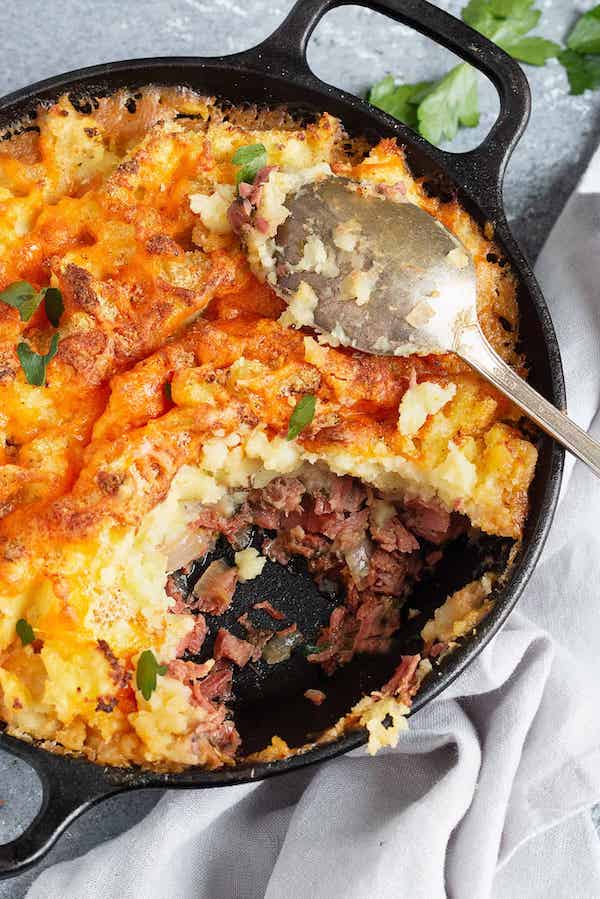 Leftover corned beef becomes this delicious cottage pie with this recipe from Seasons and Suppers.