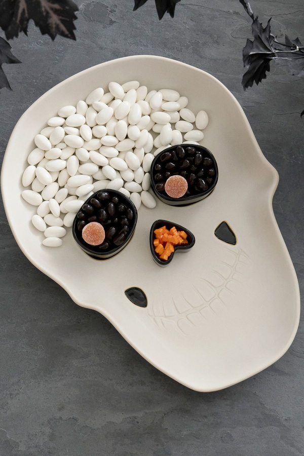 Skull Shaped server for Halloween: fill with yogurt covered nuts, raisins, you name it! | healthy halloween treats for kids