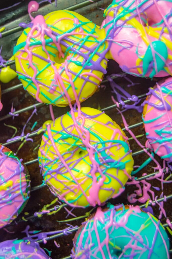 Easy rainbow donuts from Fun Money Mom: Surprise, the donuts themselves look like a tie-dyed rainbow!